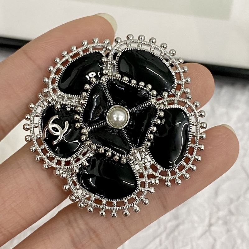 Ch**el brooches